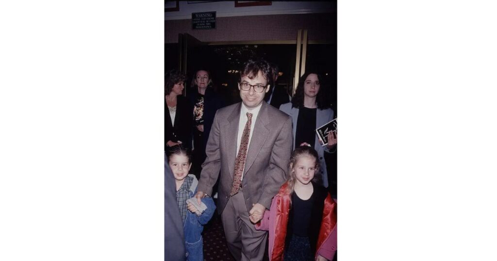 Rick Moranis as a Devoted Father